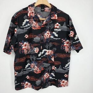 Oakley Black Button-Up Floral Hawaiian Shirt with Red and White Accents Size M.